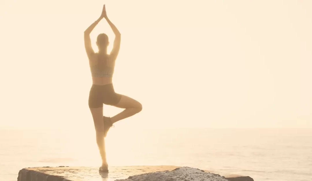 woman practicing yoga